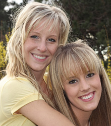 photo of smiling woman and teen